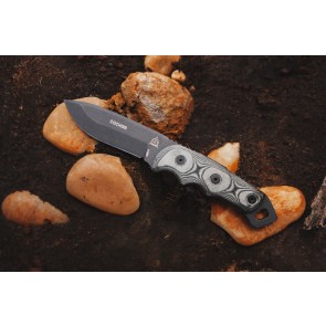 The TOPS Cochise fixed blade knife with its tactical gray hunter's point blade and black linen Micarta handle